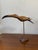 Add a touch of sculptural elegance to your home with this beautifully hand-carved vintage wooden ibis bird sculpture....