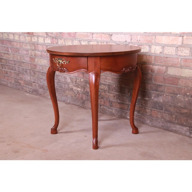 A gorgeous French Provincial Louis XV style occasional side table, nightstand, or tea table By Baker Furniture USA, Circa...