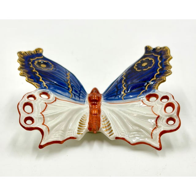 A gorgeous antique petite Japanese Meiji Period Imari porcelain butterfly sculpture wall hanging. This beautiful butterfly...