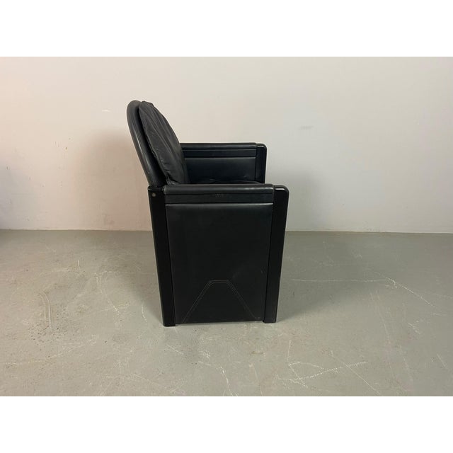 Iconic vintage bulo belgium armchair from the 1980s, crafted in high-quality black leather and featuring a sleek black...