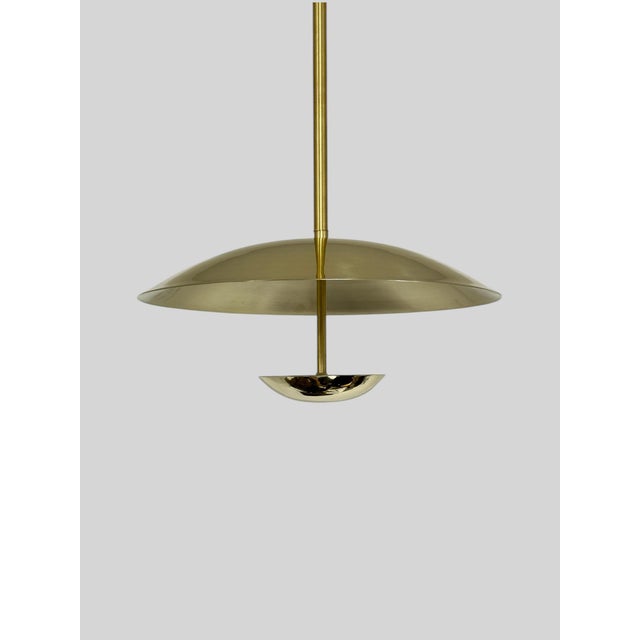 Illuminate your space with this exquisite handmade pure brass chandelier light featuring a stunning polished brass finish....