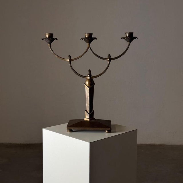 This remarkable candelabra, crafted during the Austrian Secession movement in the early 1900s, is a true testament to the...