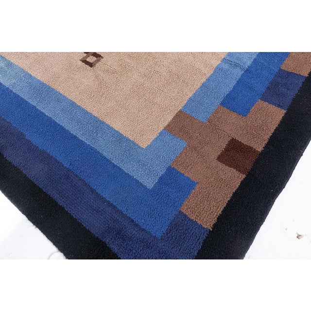 A brilliant expression of the modernist ethos, this circa 1930 French Art Deco rug showcases the architectural elegance...