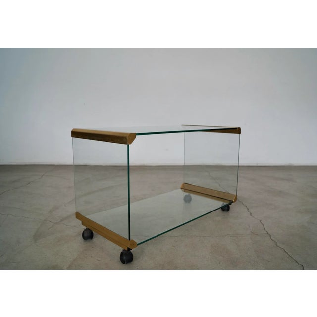 Vintage Mid-century Modern media Tv console or coffee table for sale. Designed by Leon Frost for and manufactured by Pace,...