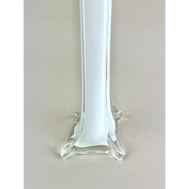 Artfully designed, slim Murano glass vase from the famous glass art workshops. Made in Italy in the mid century period...