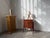 As cute as it is practical, this charming little side table from the 1930s-40s, crafted from exotic wood, will easily find...