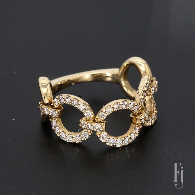 Here is a 14k Yellow Gold Ring featuring Round White Diamonds with a total carat weight of ~0.53cts. The diamonds are SI2...