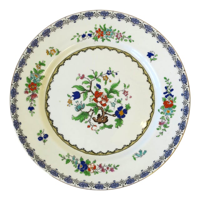 A pair of English fine bone china porcelain plates with a beautiful floral chintz botanical center design, by Adderley...