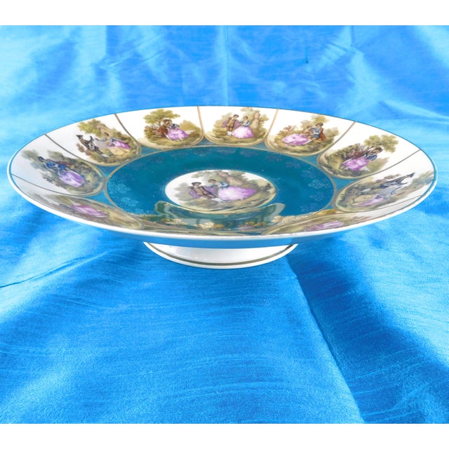 This is a large footed bowl by JWK Kuba for Josef Kuba. It is pattern KUB2 except KUB2 has a pink band and this has a teal...