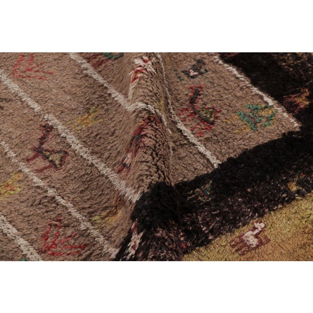 Hand-knotted in wool circa 1950–1960, this 6x7 vintage Kars rug is a soulful treasure from Rug & Kilim’s exceptional mid-...