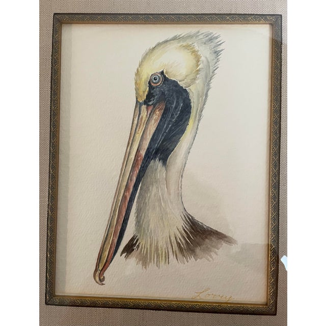 Beautiful hand-painted, watercolor of a pelican head signed by the artist and framed. 18 inches tall by 15.5 inches wide...