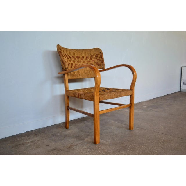 This armchair, in the style of Bas van Pelt, was produced by Vroom & Dreesman in the 1960s.