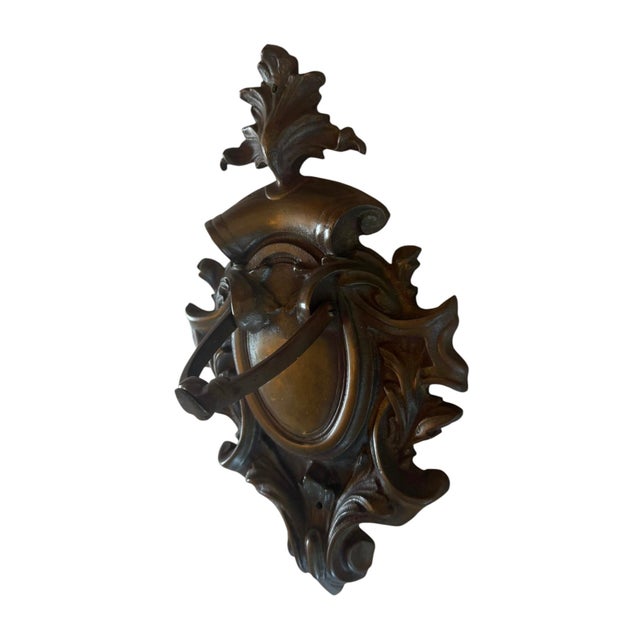 This is such a great antique door knocker. Very large with the original bronzed patina from the turn of the 19th century....