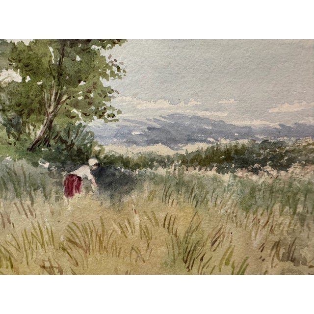 Original watercolor on paper depicting a pastoral meadow with tall grasses, mature trees, distant hills and a small figure...
