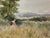 Original watercolor on paper depicting a pastoral meadow with tall grasses, mature trees, distant hills and a small figure...