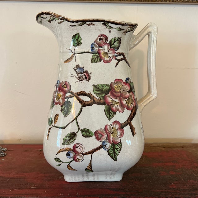 Large Victorian Plum Blossoms Patterned Pitcher, Ewer Measures: 11.75" height; base measures 4 3/8" x 4 3/8" 8.5" length...