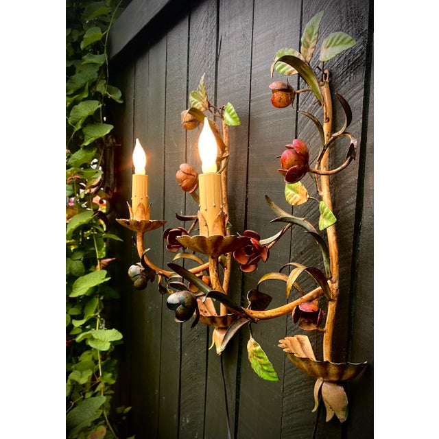 Vintage Italian Tole (Tôleware) Flower Sconces, renowned for their hand-painted metal construction, vibrant botanical...