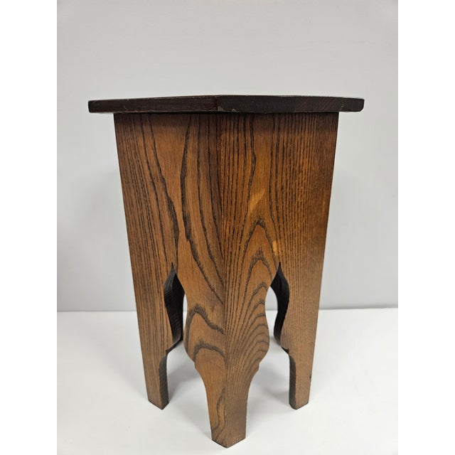 This hexagonal wooden plantstand or small table has an Arts & Crafts to Moorish style appeal. The stand is in very good...