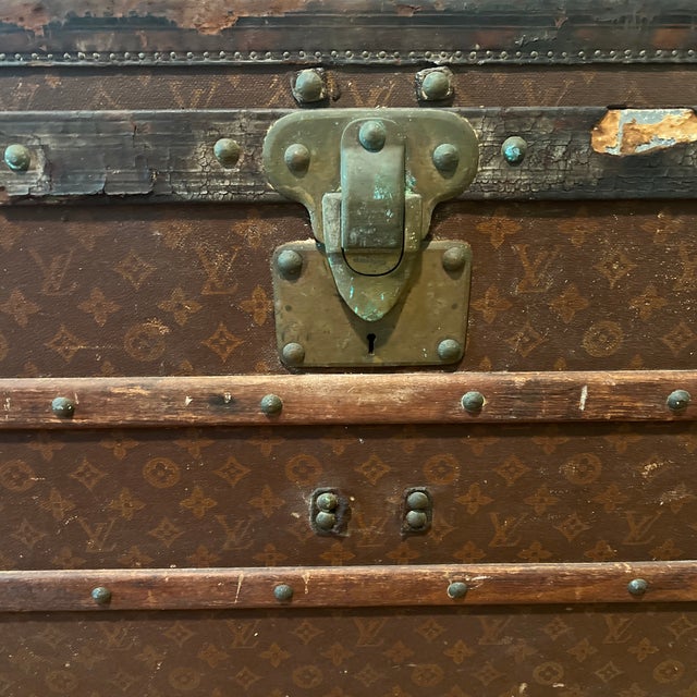 Vintage Authentic Louis Vuitton Travel Trunk with original label inside. Brass detailing. Leather and Wood. Has been...