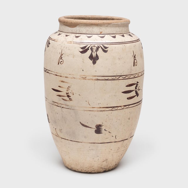 This impressive glazed vessel dates to the mid-19th century and was used to store condiments or pickles in a Qing-dynasty...