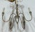 Elegant chandelier made of metal , painted in silver and gold ,with five stems 60/watt light each Single Neoclassic Style...