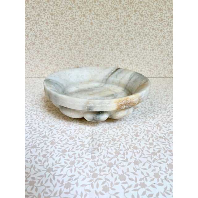 With gorgeous veining of grey and rust throughout, this solid marble bowl will make a statement piece in your home. Use as...