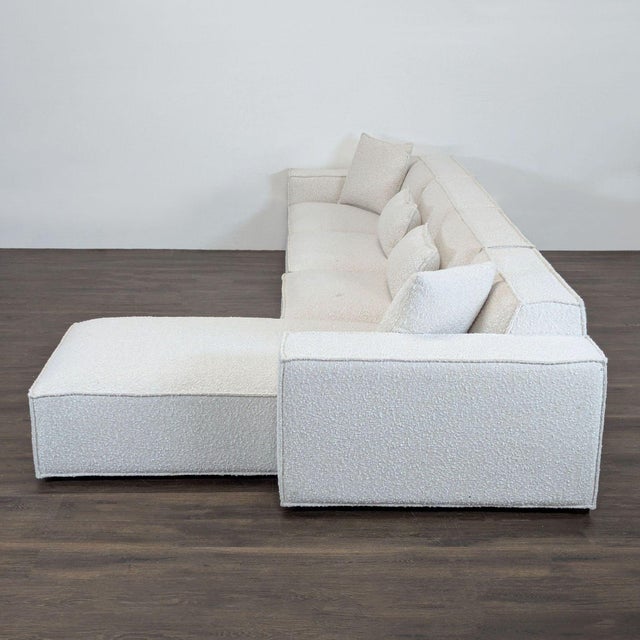 This Rove Concepts sectional features a modern design with clean lines and soft boucle upholstery. The right-facing chaise...