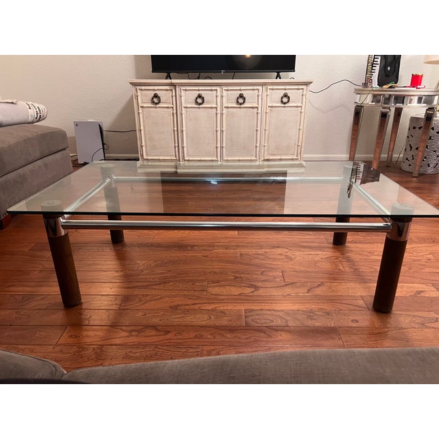 Beautiful Scandinavian Mid Century Modern large heavy coffee table. This has chrome detailing to connect the wood legs in...