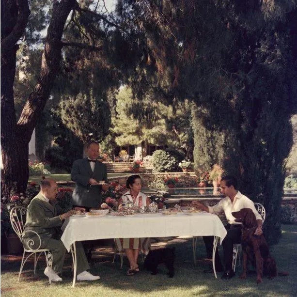 Al Fresco Tea 1961 Colonel Dimitris Levidis enjoying a meal in the fresh air at Harvati with his wife and son, July 1961....