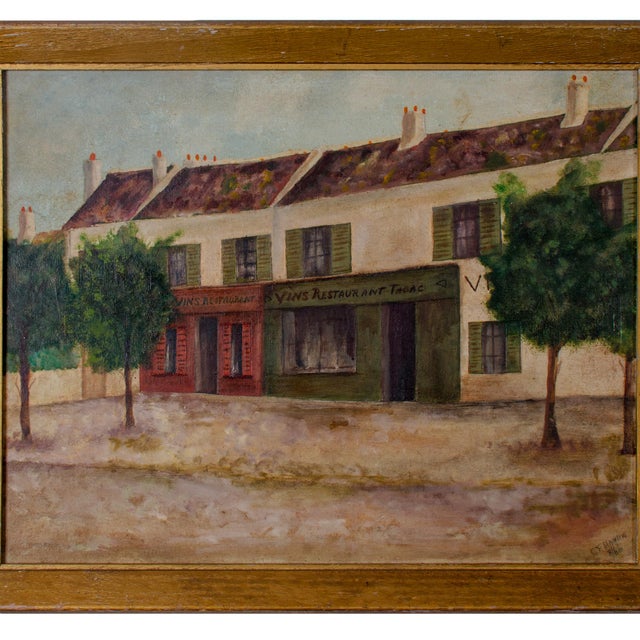 Offered is an oil painting of a French street scene depicting a restaurant with signage. Signed C.F. Hanna, 8/66. Sight:...