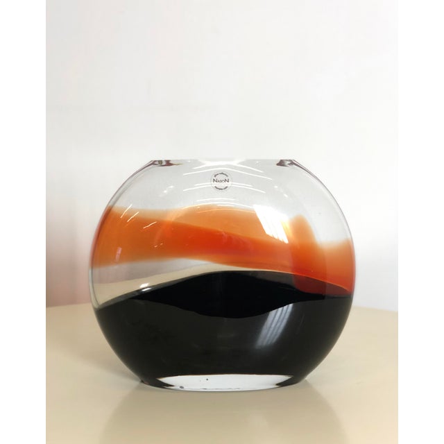 Vintage 1970s murano glass cased flower vase. The vase is italian-made in the 1970s, produced by nason, an established...