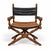 This is a pair of campaign style leather carved walnut bobbin x-frame director’s chairs attributed to Marge Carson. They...