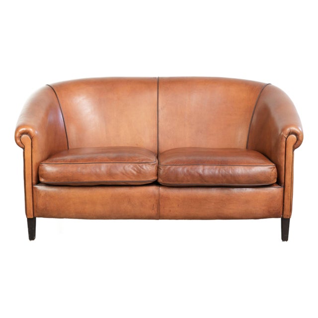 Sheepskin 2-Seater Sofa with Warm Cognac Brown Color Scheme and Finish with Black Piping For Sale