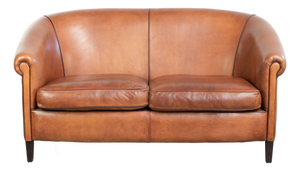 Sheepskin 2-Seater Sofa with Warm Cognac Brown Color Scheme and Finish with Black Piping