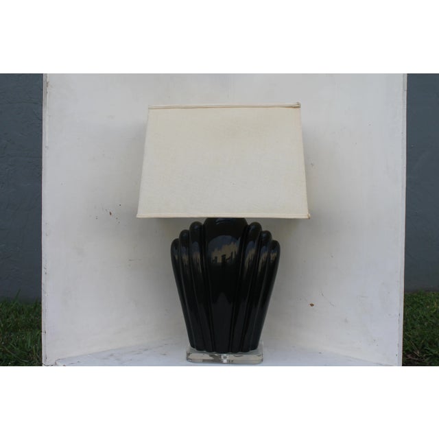 Mid Century Modern Black Glazed Ceramic Table Lamp on Lucite Base. Shade included.