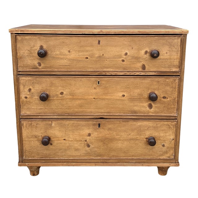 This lovely antique pine chest of drawers dates to 19th century England and showcases the simple beauty and craftsmanship...
