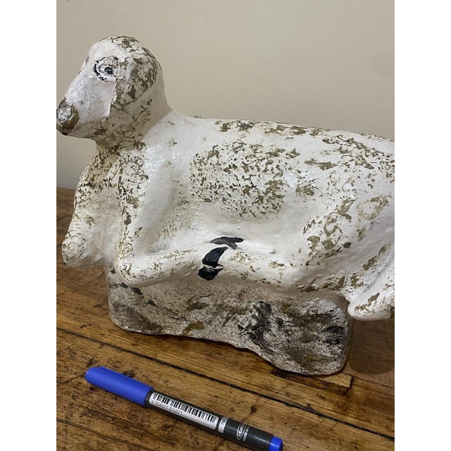 Beautiful statue depicting a sitting sheep, made in the first half of the 1900s in a mixed material of cement and stone...