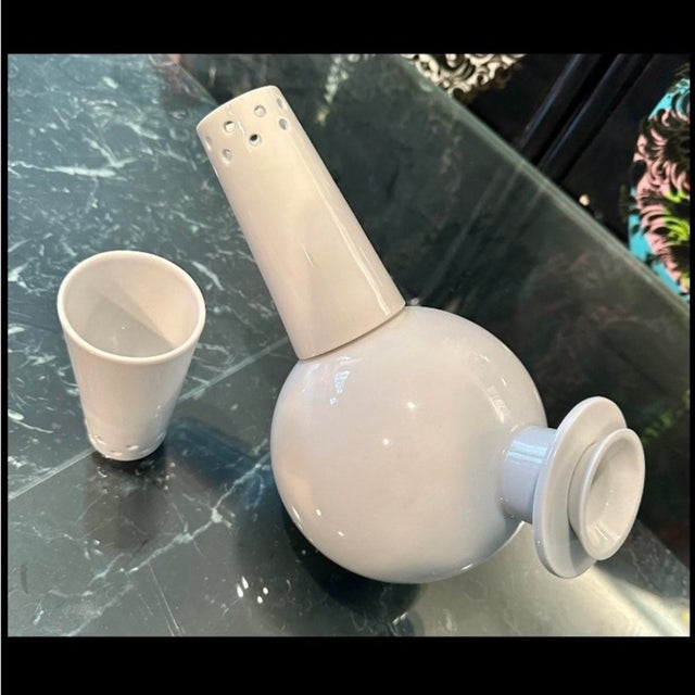 This museum quality artistic tea set dates from the 1990's. It has never been used. Marked on the bottom "Arzenal" we have...