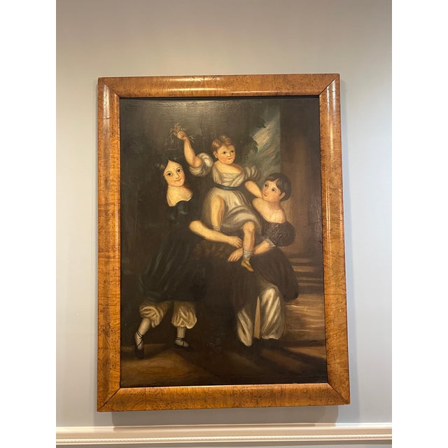 A large 19th century American folk art, The trio of children is a classic "sibling portrait." The central child being held...