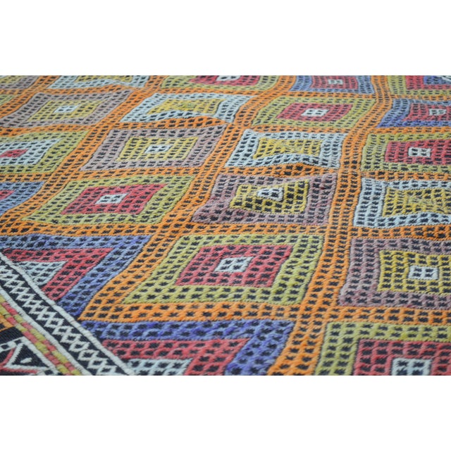 Vintage Turkish Anatolian hand woven kilim with natural colors,organic wool and geometric pattern.