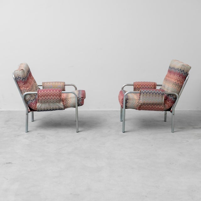 Pair of armchairs made in the 1970s. Upholstered in Missoni patterned fabric. Tubular metal frame. Item as shown in the...