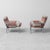 Pair of armchairs made in the 1970s. Upholstered in Missoni patterned fabric. Tubular metal frame. Item as shown in the...