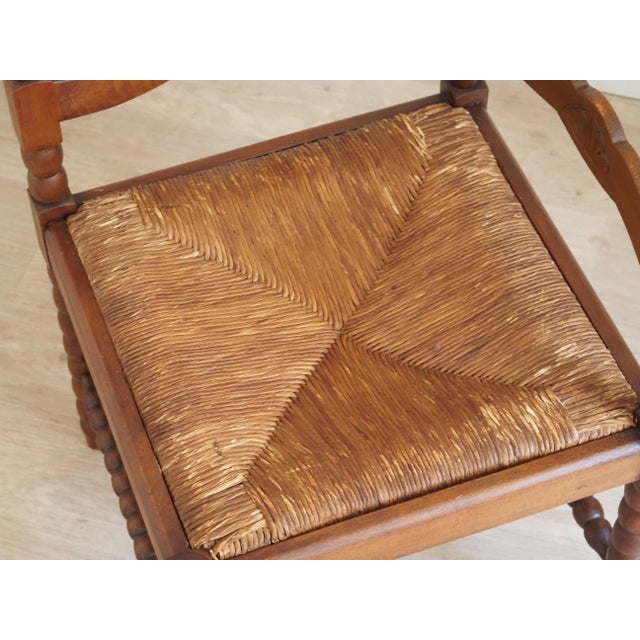 Corner chairs of this type emerged around 1900–1920 as space-saving seating for the corners of kitchens, living rooms, or...