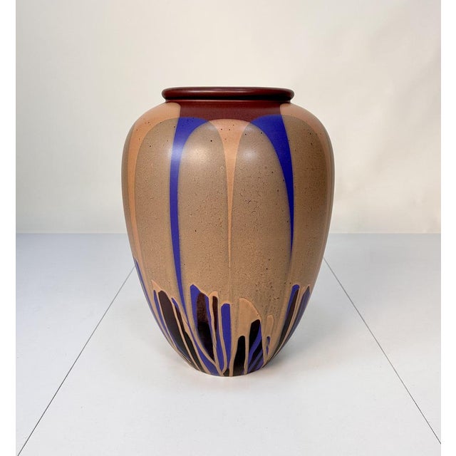 A large high-quality ceramic art floor vase from the renown West-German Steuler-Keramik manufactory, produced around 1980....