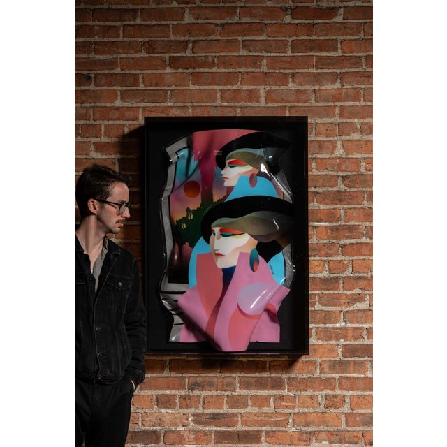 This striking 3-D wall artwork by Ned Moulton showcases bold Deco-revival faces, airbrushed gradients, and a chromatic...