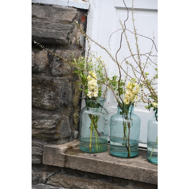This piece started life in a French pantry, storing summer's harvest behind thick aqua glass. Today it makes a wonderful...