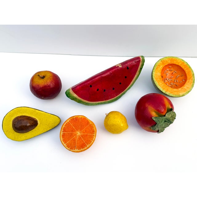 A darling vintage set of handmade papier-mâché fruit, including apple, watermelon, cantaloupe, persimmon, lemon, orange,...