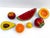 A darling vintage set of handmade papier-mâché fruit, including apple, watermelon, cantaloupe, persimmon, lemon, orange,...