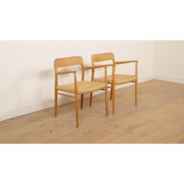 Set of 2 beautiful and rare vintage dining chairs. These chairs were designed by Niels Otto Møller, model 56. The chairs...