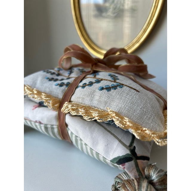 A collection of two decorative pillows filled with fragrant dried lavender. Pretty enough to display, then can also be...
